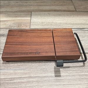 Wooden walnut Cheese Slicer with Metal Handle never used with feet